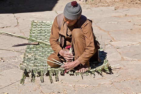 Plaiting a bamboo mat